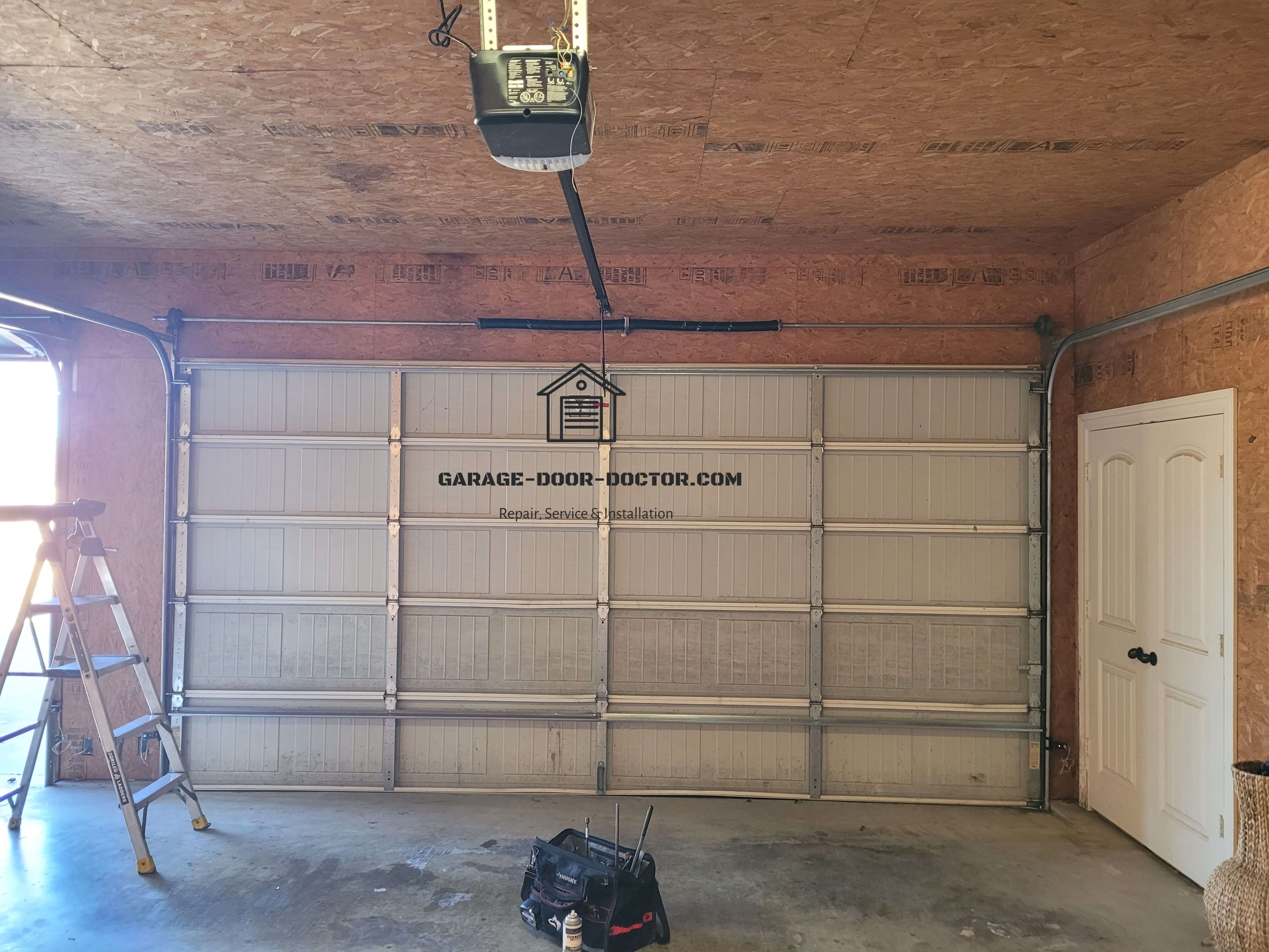 new-garage-door-torsion-springs-replacement